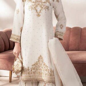 Beautiful women white sharara suit with heavy embroidary and pearl work
